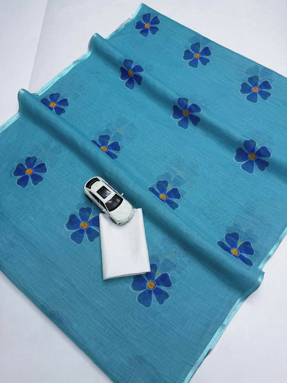 Prime Volt Women's Sky Blue Floral Digital Print Soft Linen Saree With Blouse | Grocsy