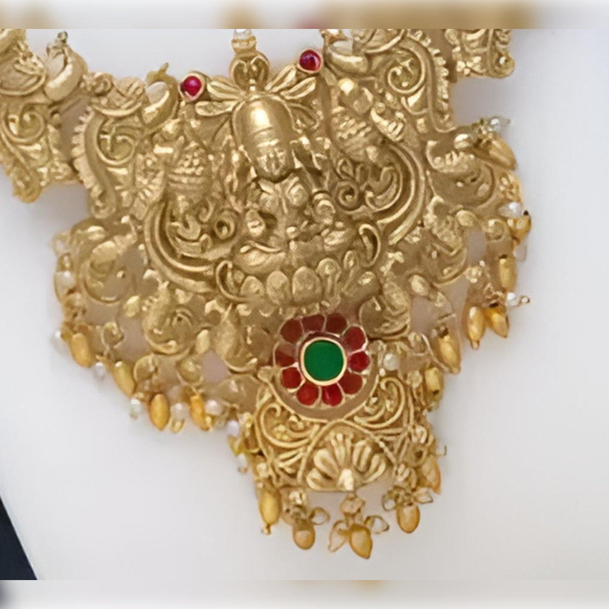 Jewel City Traditional Temple Design Gold Necklace Set with Red and Green Stone Accents - Bridal Jewelry | Grocsy