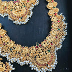 Jewel City Gold-Plated Traditional Goddess Lakshmi Temple Jewellery Bridal Set with Ruby Stone Long Haram Double Necklace Set | Grocsy
