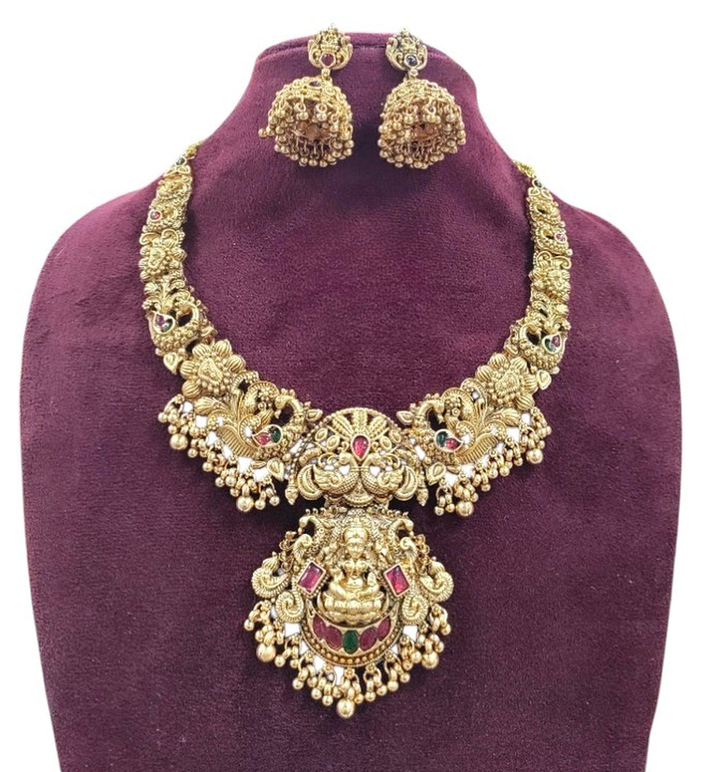 Jewel City Gold Lakshmi Temple Necklace Set - Bridal Jewelry with Ruby and Emerald Accents | Grocsy