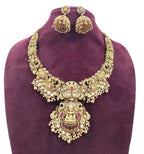 Jewel City Gold Lakshmi Temple Necklace Set - Bridal Jewelry with Ruby and Emerald Accents | Grocsy