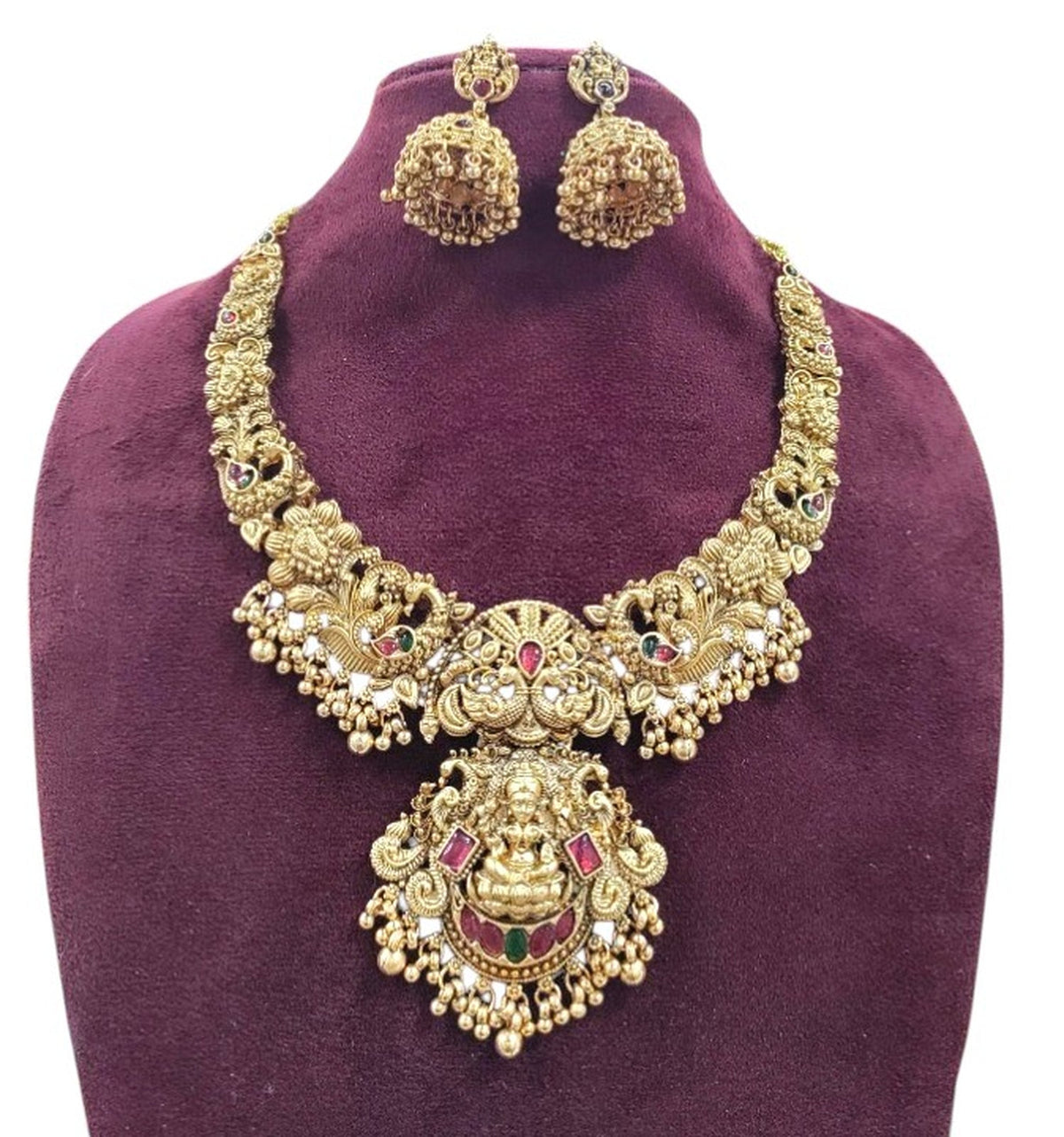 Jewel City Gold Lakshmi Temple Necklace Set - Bridal Jewelry with Ruby and Emerald Accents | Grocsy