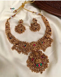 Jewel City Gold Lakshmi Temple Necklace Set - Bridal Jewelry with Ruby and Emerald Accents | Grocsy