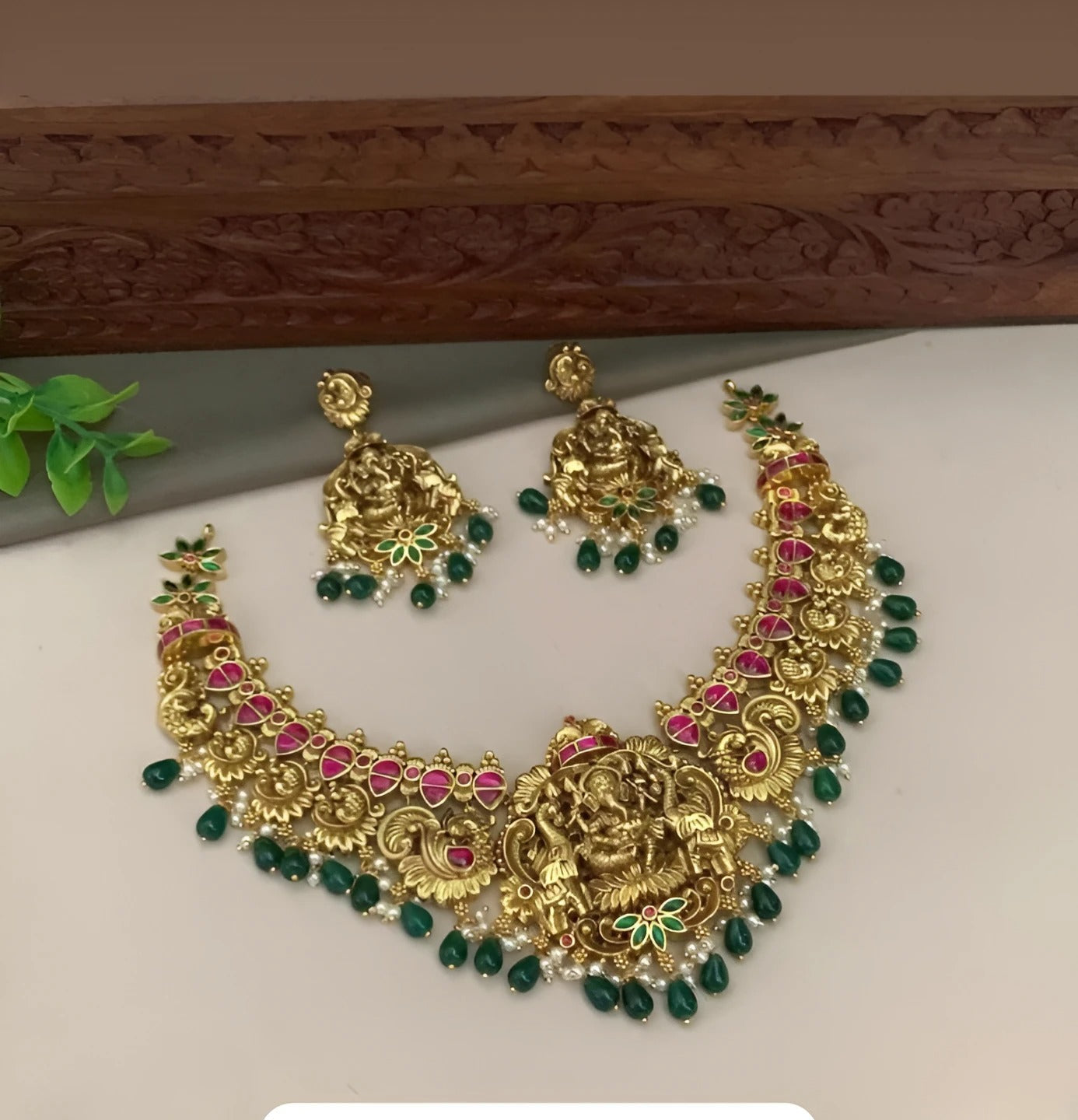 Jewel City Ganesha Temple Necklace Set - Antique Gold Finish with Emerald Drops & Ruby Pink Stones (Premium Bridal Collection) | Grocsy