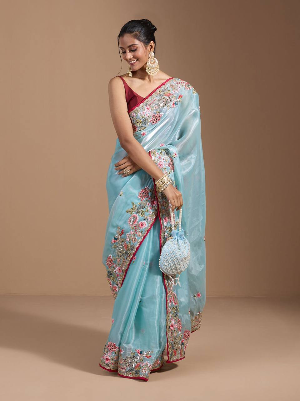 Teeya Creation Sky Color Organza Silk Heavy Work Saree | Grocsy