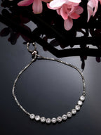 NVR Women Silver-Plated American Diamond Studded Rakhi With Roli Chawal | Grocsy