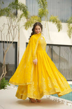Vastranavya Yellow Faux Blooming with Embroidery Zari Sequins Work Gown | Grocsy