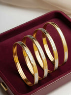 NVR Women Set of 4 Gold Plated CZ Toned Bangle | Grocsy