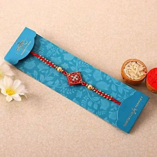 Sleek American Diamond Rakhi And Soan Papdi | Grocsy