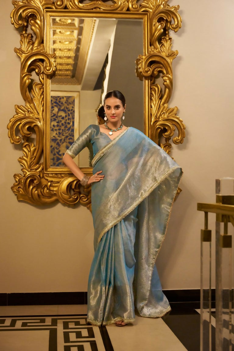 Vastranavya Sea Blue Tissue Shimmer Zari Weaving Work Saree with Unstitched Blouse | Grocsy