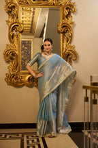 Vastranavya Sea Blue Tissue Shimmer Zari Weaving Work Saree with Unstitched Blouse | Grocsy