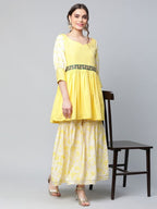 Ahalyaa Women Yellow Crepe Floral Short Kurta with Sharara Set | Grocsy