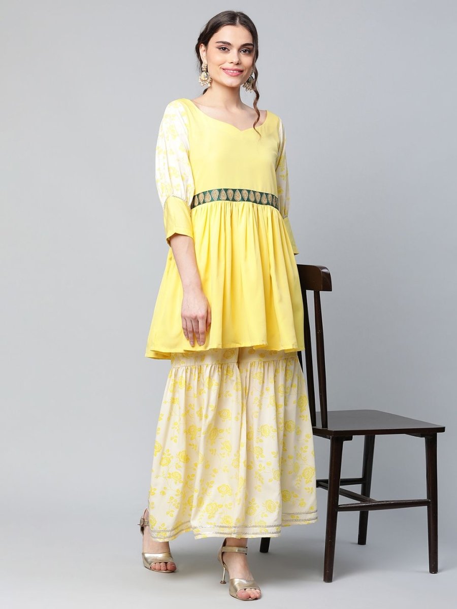 Ahalyaa Women Yellow Crepe Floral Short Kurta with Sharara Set | Grocsy