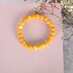 NVR Men & Women Yellow Marbel Crystal Elasticated Bracelet | Grocsy