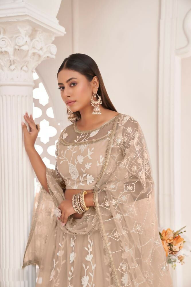 Aastha Fashion Dusty Chiku Butterfly Net White Cotton Thread Work, Zari Work And Sandwich Sequence Work Embroidery Wedding Wear Lehenga Choli | Grocsy