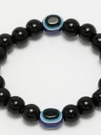 NVR Women & Men Black Evil Eye Elasticated Rakhi With Roli Chawal | Grocsy