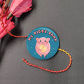 Indianvibez My Piggy Bank Metal Rakhi with Fridge Magnet - Kids Rakhi | Grocsy