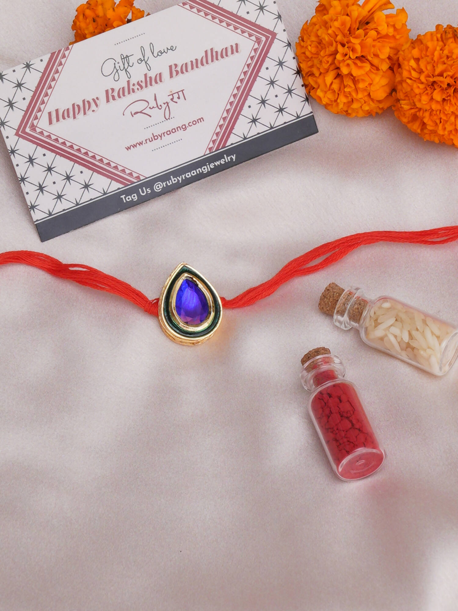 Designer kundan Rakhi - Ruby Raang | Grocsy