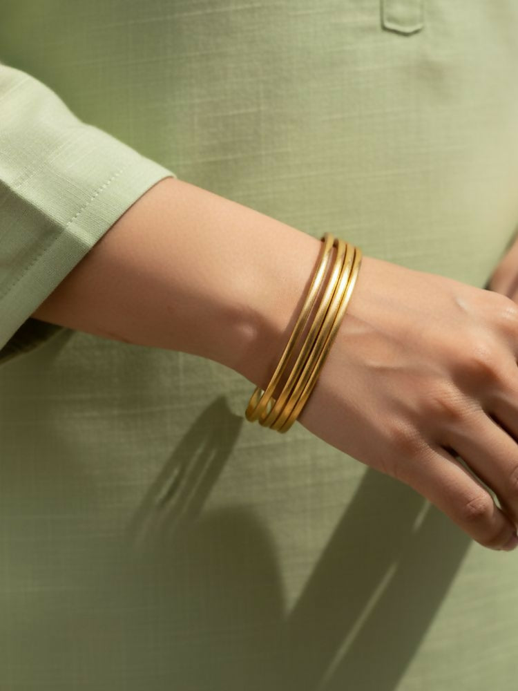 NVR Women Set of 4 Gold Plated Handcrafted Bangle | Grocsy