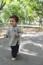 Mhyssa Manny Full Sleeve Beige T-shirt With Blue Pants Set For Kids | Grocsy