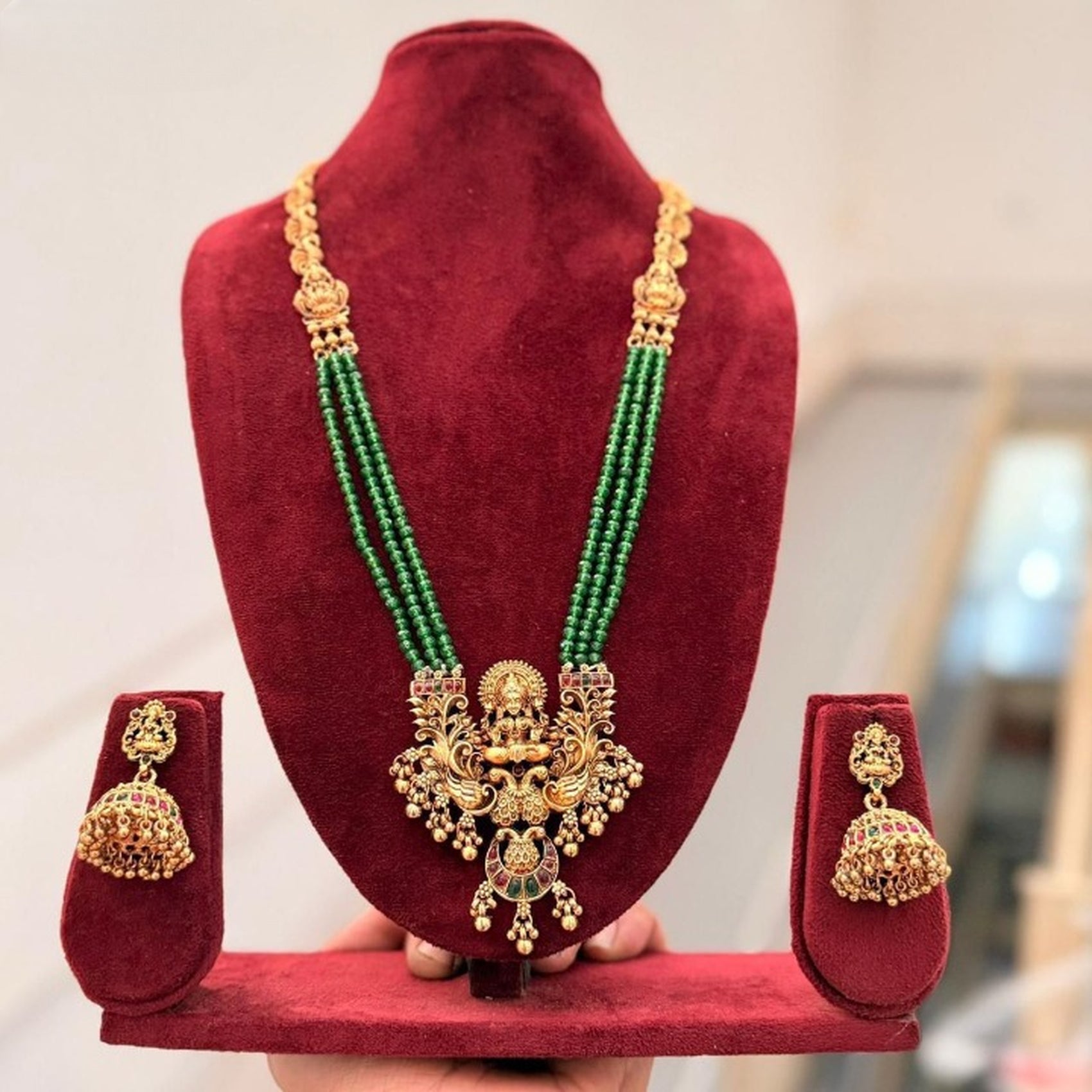 Jewel City Antique Gold-Plated Lakshmi Pendant Green Bead Necklace Set with Jhumka Earrings - Traditional Temple Jewelry | Grocsy