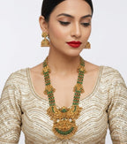 Jewel City Stunning Gold-Plated Temple Jewelry Set with Emeralds | Traditional Haram & Jhumkas | Bridal & Festival Wear | Grocsy