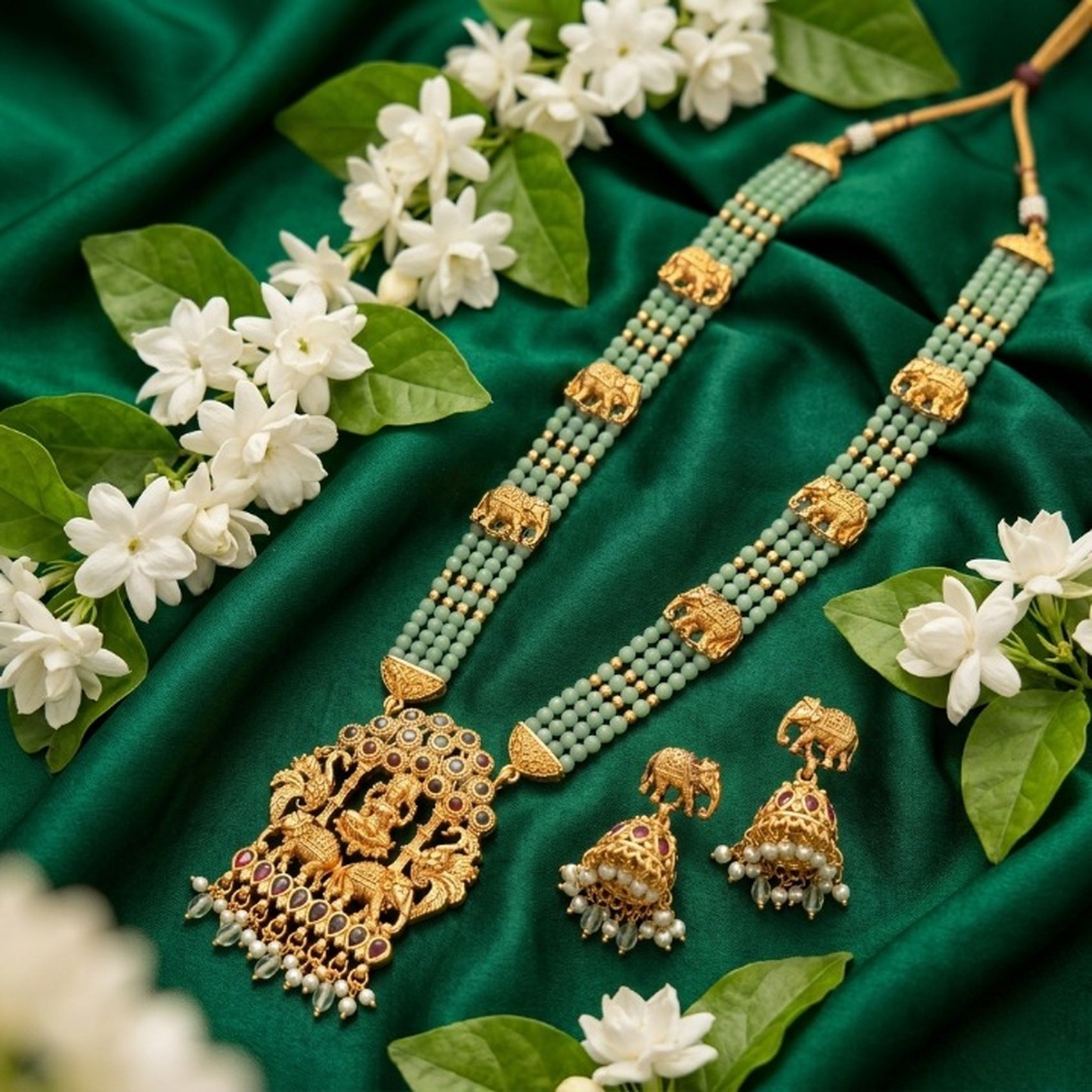 Jewel City Traditional Gold-Plated Temple Jewelry Set - Handcrafted Elephant Motif Green Bead Long Necklace & Jhumka Earrings | Grocsy