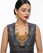 Jewel City Antique Gold-Plated Lakshmi Temple Necklace Set with Green Beads and Jhumkas | Grocsy