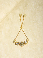 Women's Gold-Polished White Brass Kundan Charm Bracelet - Ruby Raang