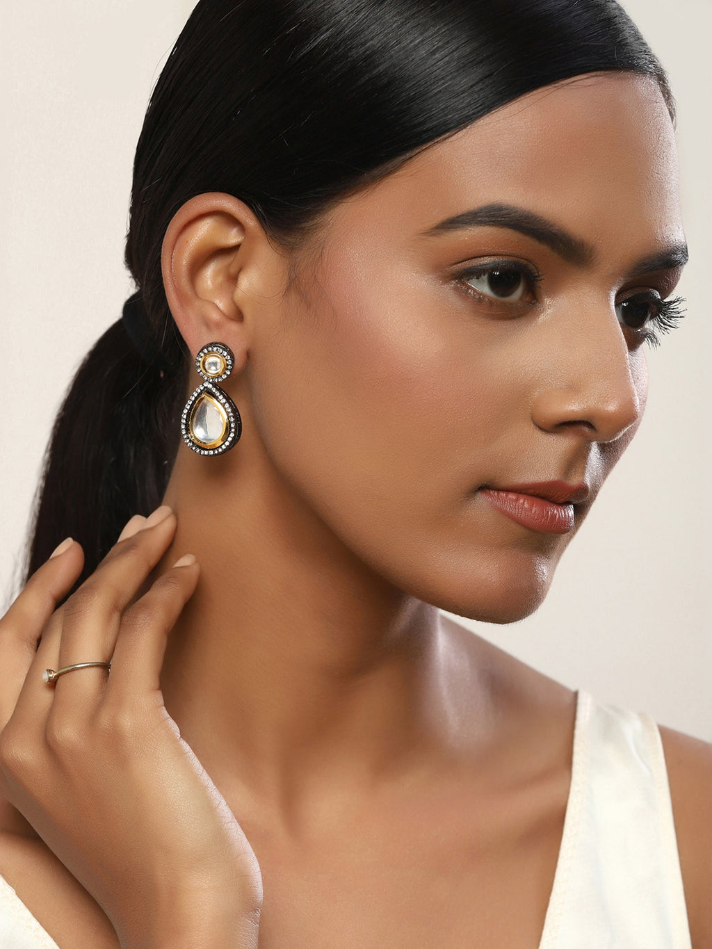 Silver-Plated Teardrop Shape Kundan Studded Drop Earrings - Ruby Raang | Grocsy