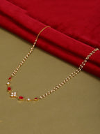 Red Stone & Clear Patchi Kundan in Pearl Kamar Band - Ruby Raang | Grocsy