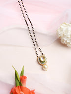 Gold-Polished Black Beaded White Kundan Studded Mangalsutra - Ruby Raang | Grocsy