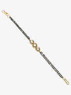 Black Gold-Toned Kundan Bracelet Mangalsutra - Ruby Raang