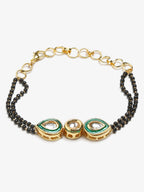 Black Gold-Polished Kundan Bracelet Mangalsutra - Ruby Raang | Grocsy