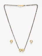 Black Gold-Toned Kundan Mangalsutra With Studs - Ruby Raang | Grocsy