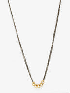 Black Gold-Polished Beaded White Kundan Studded Mangalsutra - Ruby Raang | Grocsy
