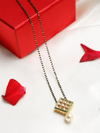 Women's Gold-Polished Black Beaded Mangalsutra - Ruby Raang | Grocsy