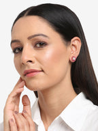 Maroon Gold-Polished Floral Studs Earrings - Ruby Raang | Grocsy