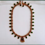 Jewel City Antique Gold-Plated Lakshmi Temple Necklace Set with Pearls & Green Stones for Women | Grocsy