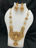 Jewel City Antique Gold-Plated Temple Lakshmi Haram Necklace Set with White Beads & Jhumka Earrings | Grocsy