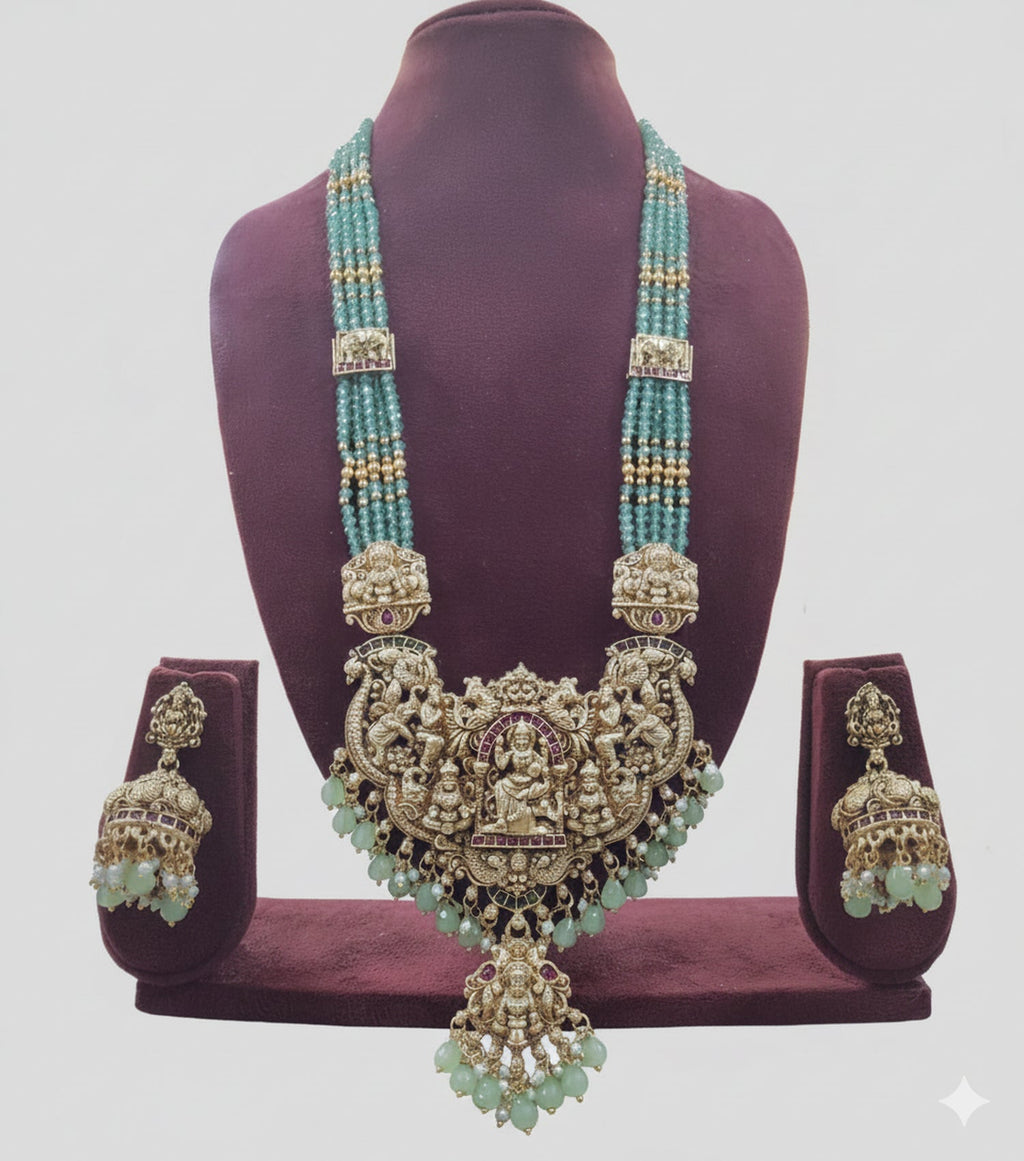Jewel City Antique Gold-Plated Temple Lakshmi Haram Necklace Set with Green Beads & Jhumka Earrings | Grocsy