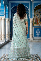 Sangam Prints Pastel Mint Green Cotton Blend Woven Work Traditional Saree | Grocsy