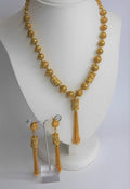 Jewel City Elegant Gold Filigree Tassel Necklace and Earring Set - Traditional Indian Bridal Jewelry | Grocsy