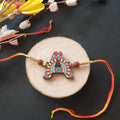 Indianvibez Alphabet A Wooden Rakhi - Kids Rakhi | Grocsy