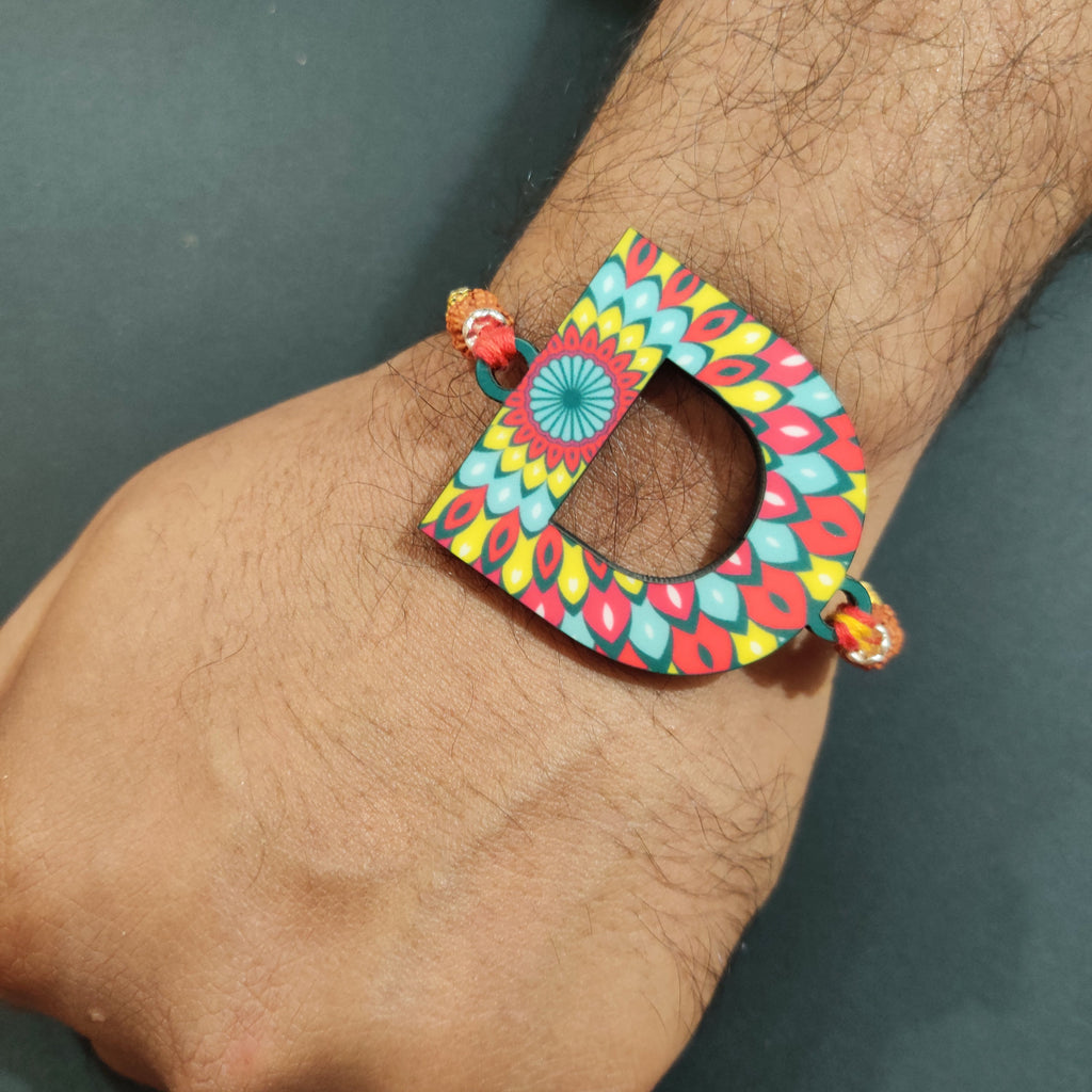 Indianvibez Alphabet D Wooden Rakhi - Kids Rakhi | Grocsy