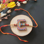 Indianvibez Alphabet E Wooden Rakhi - Kids Rakhi | Grocsy