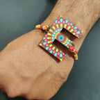 Indianvibez Alphabet E Wooden Rakhi - Kids Rakhi | Grocsy