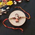 Indianvibez Chota Bheem Wooden Rakhi with Rudraksha, Cartoon Rakhi for Bro, Shop India - Kids Rakhi | Grocsy