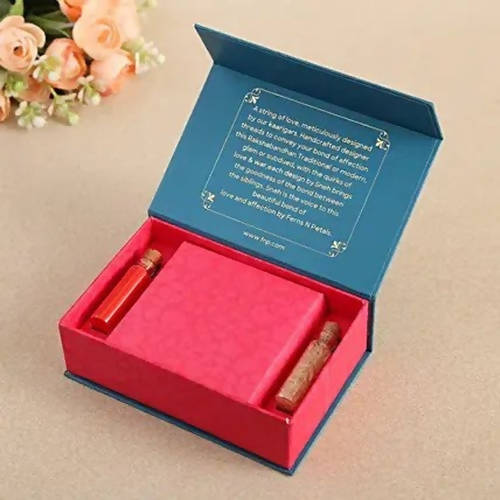 Om Golden Bracelet Rakhi & Kaju Rolls Box | Grocsy