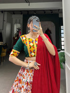 Lorenvalley Red Dola Silk and Cotton with Patola Print With Foil Work And Original Mirror Gamthi Lace Lehenga Choli | Grocsy